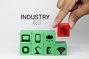 colored cubes with technology items and the word Industry 4.0. Industry 4.0 infographic.